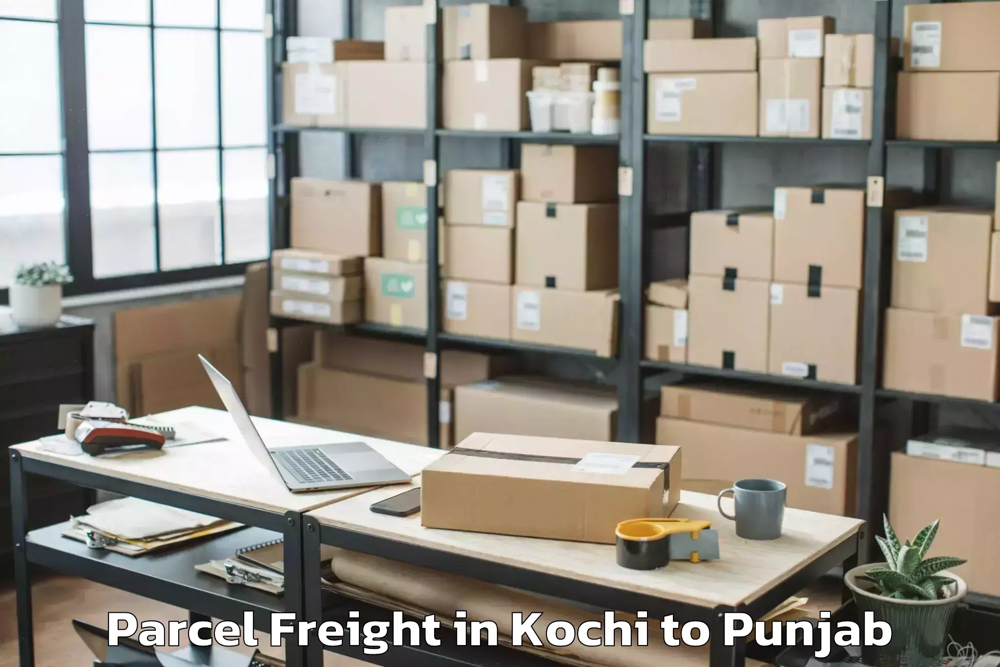 Book Kochi to Shahkot Parcel Freight